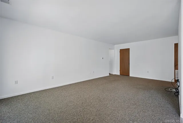 an empty room with a natural light