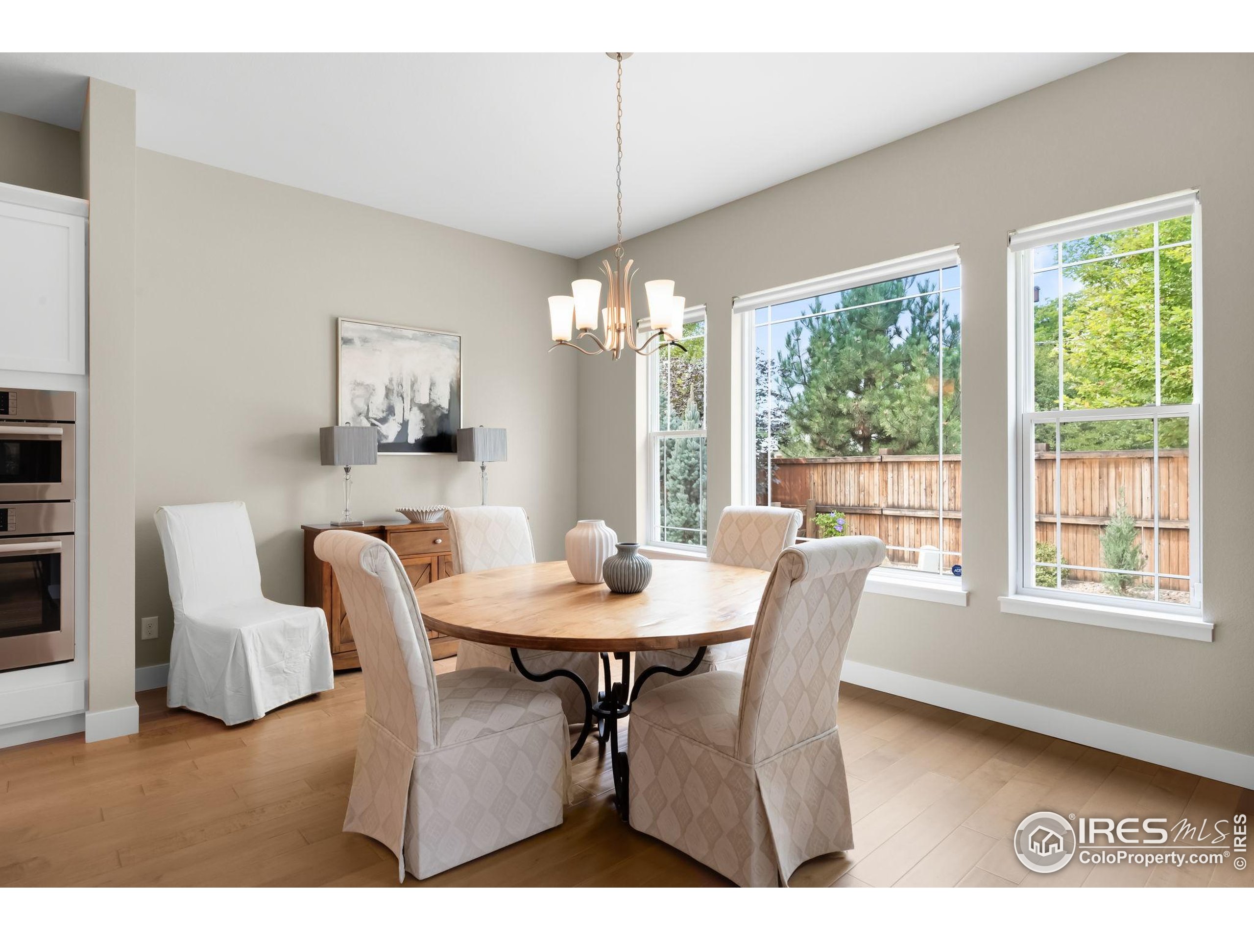 5799 Howell Street Golden, CO 80403 - Photo 14 of 50 a dining room with furniture and window