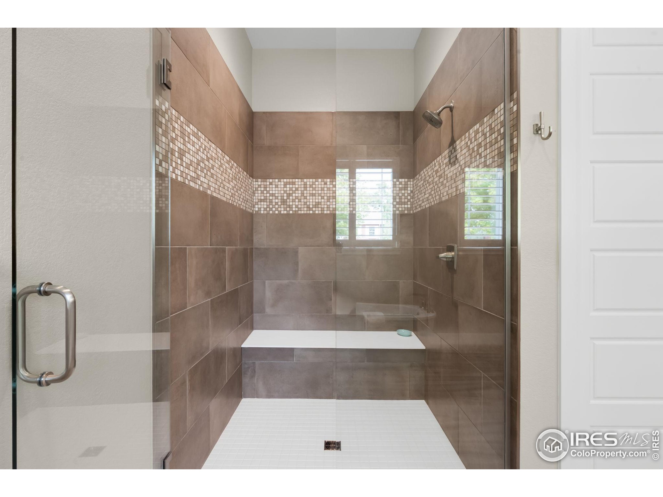 5799 Howell Street Golden, CO 80403 - Photo 32 of 50 a bathroom with a shower