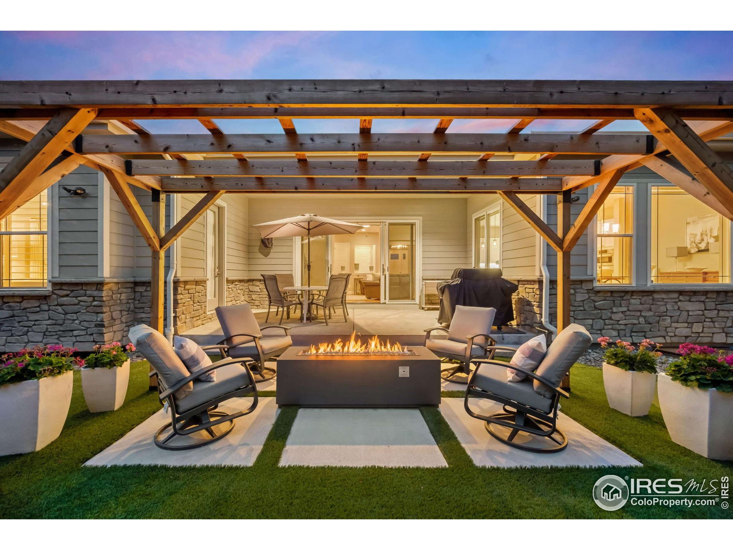 5799 Howell Street Golden, CO 80403 - Photo 38 of 50 a view of a chairs and table in a patio