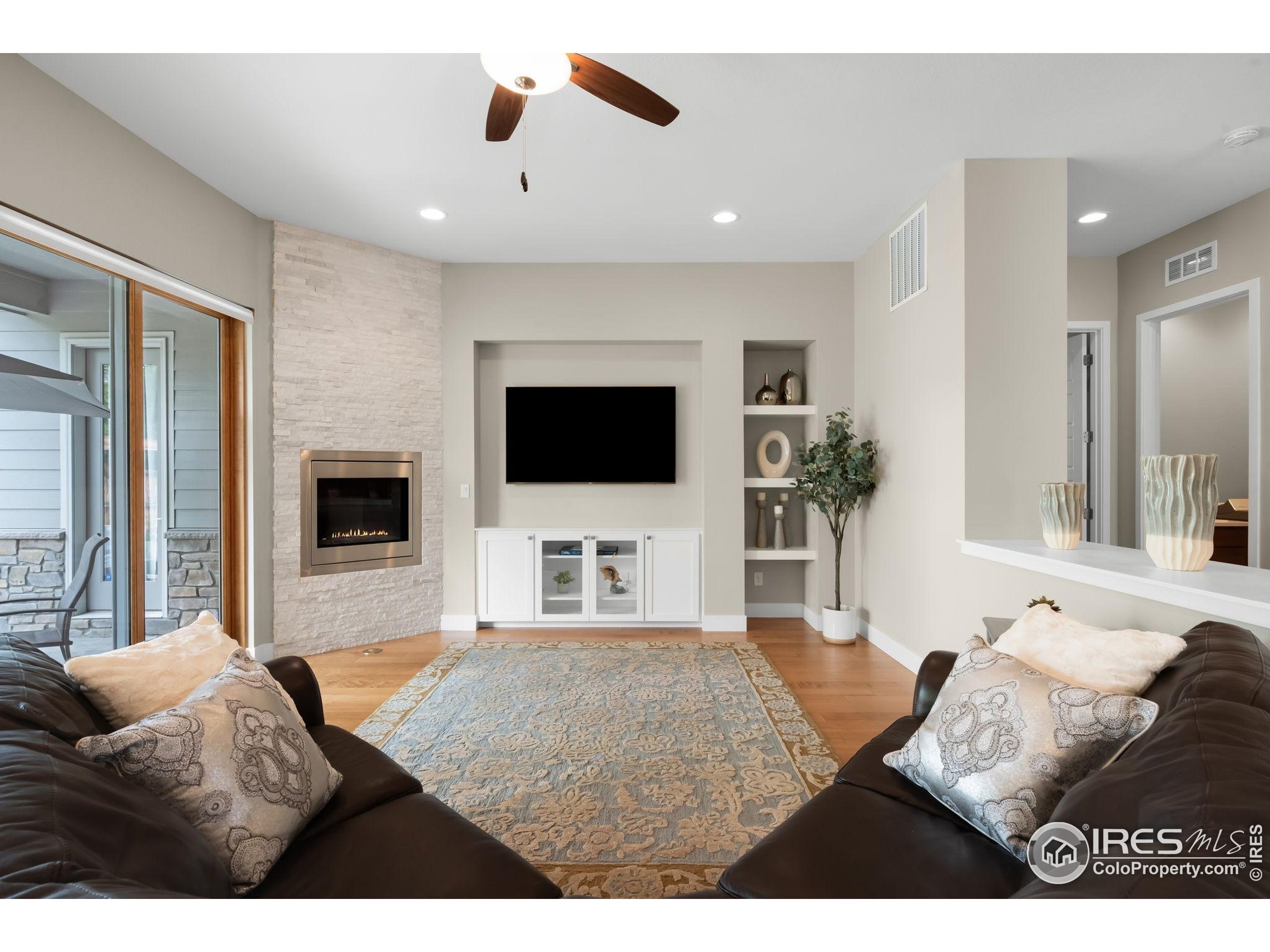 5799 Howell Street Golden, CO 80403 - Photo 7 of 50 a living room with furniture and a flat screen tv