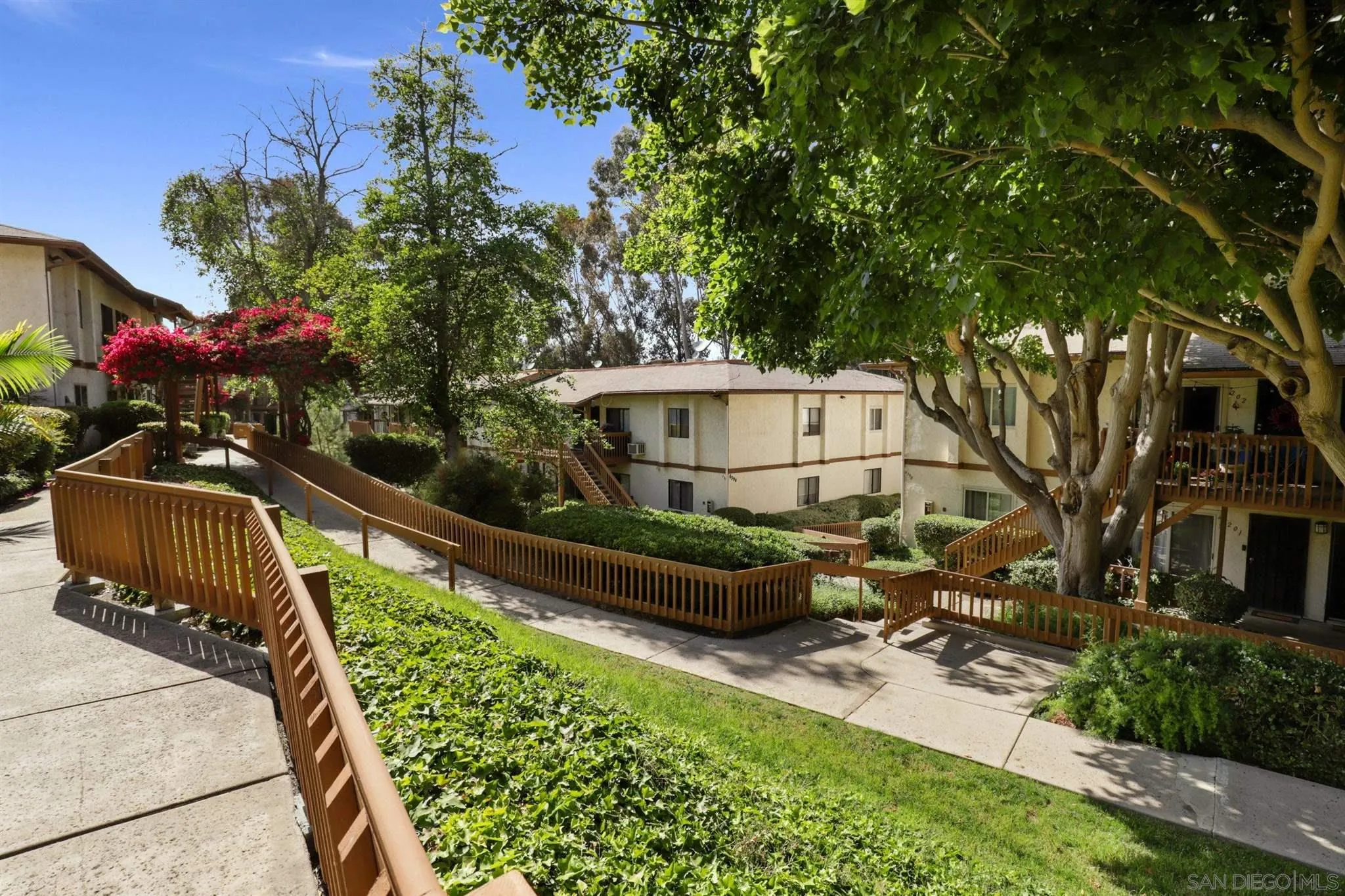 6370 Rancho Mission Road, Unit 920 San Diego, CA 92108 - Photo 19 of 22 a view of a garden with sitting area