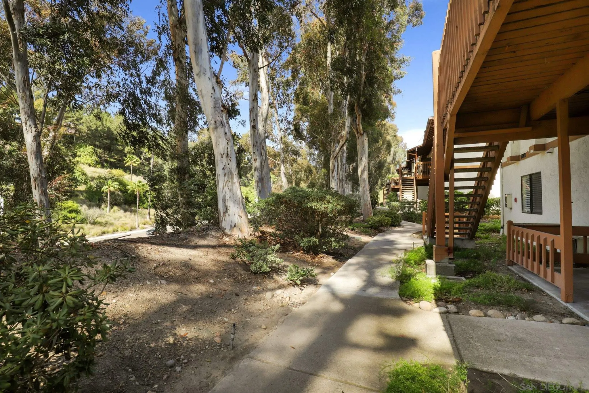 6370 Rancho Mission Road, Unit 920 San Diego, CA 92108 - Photo 21 of 22 a view of a house with a yard