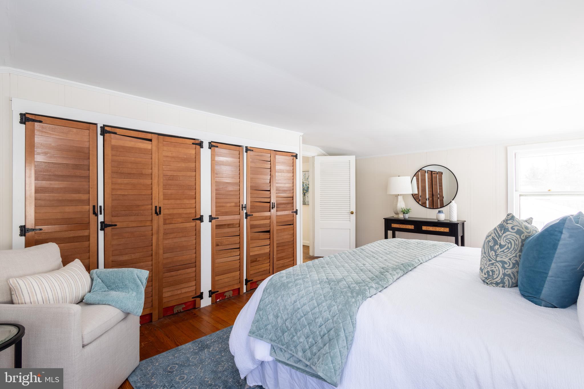 1301 Stump Road North Wales, PA 19454 - Photo 13 of 19 a bedroom with a bed couch and a large window