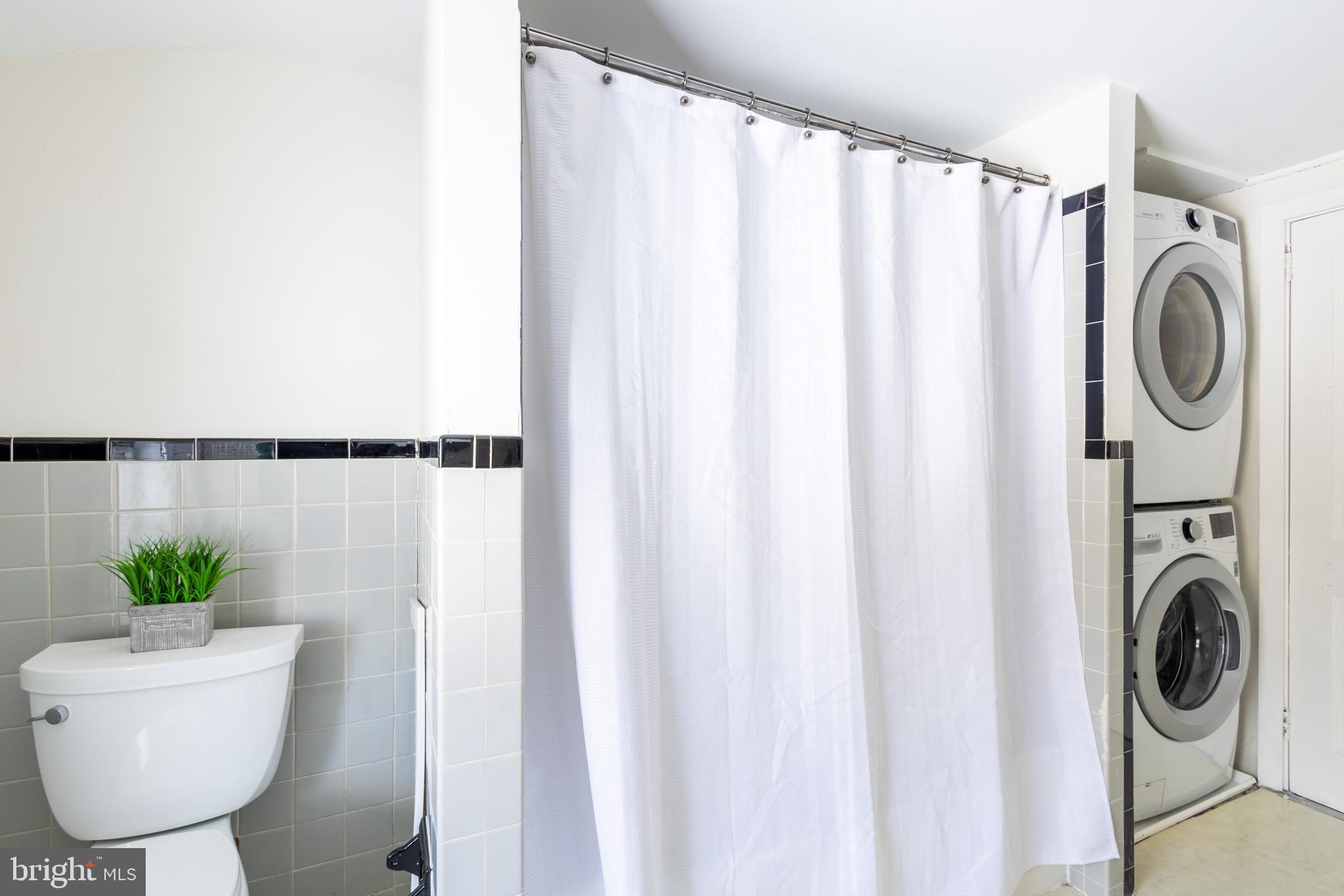 1301 Stump Road North Wales, PA 19454 - Photo 15 of 19 a bathroom with a sink a mirror a tub and shower