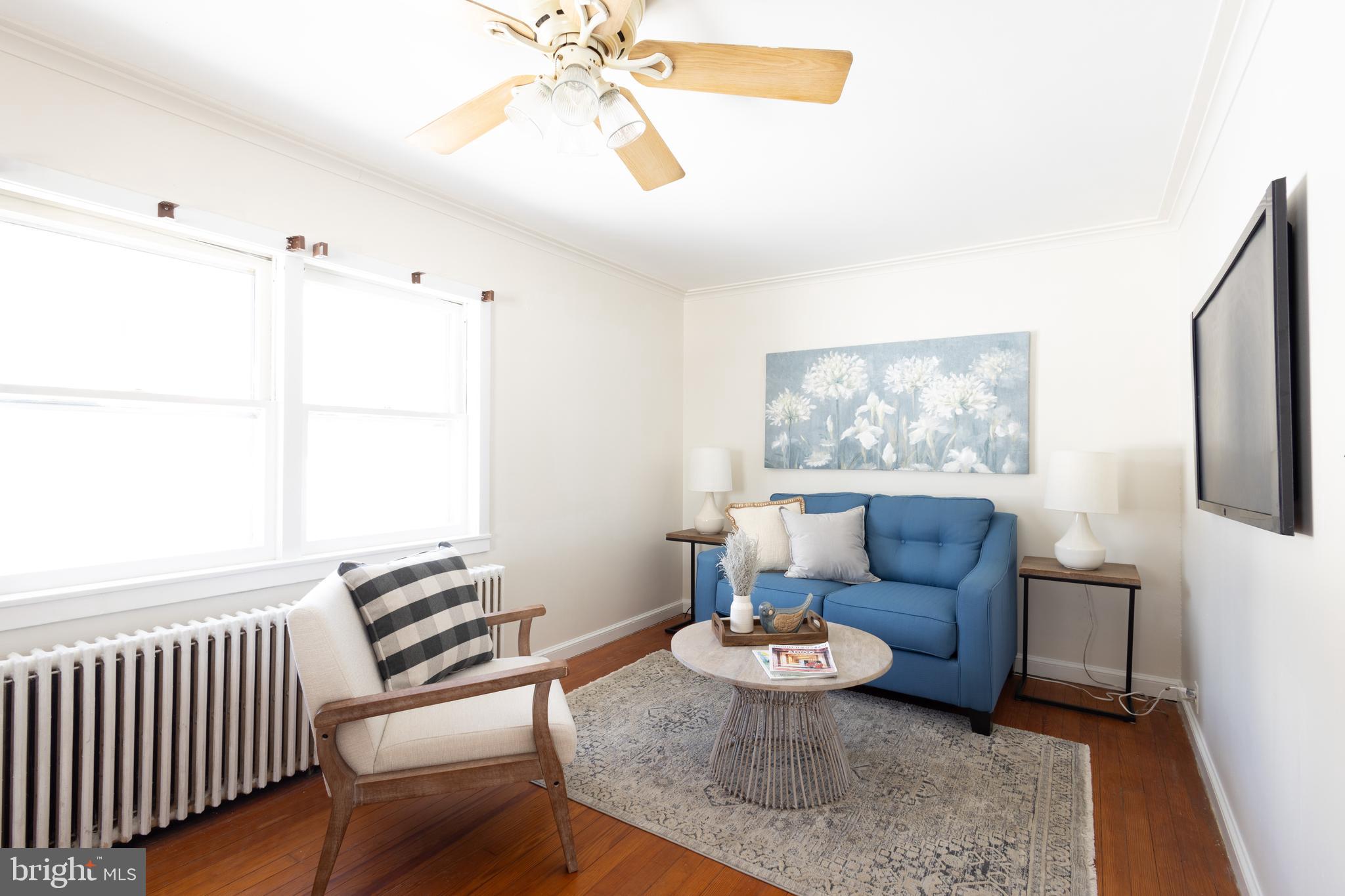 1301 Stump Road North Wales, PA 19454 - Photo 7 of 19 a living room with furniture and a large window