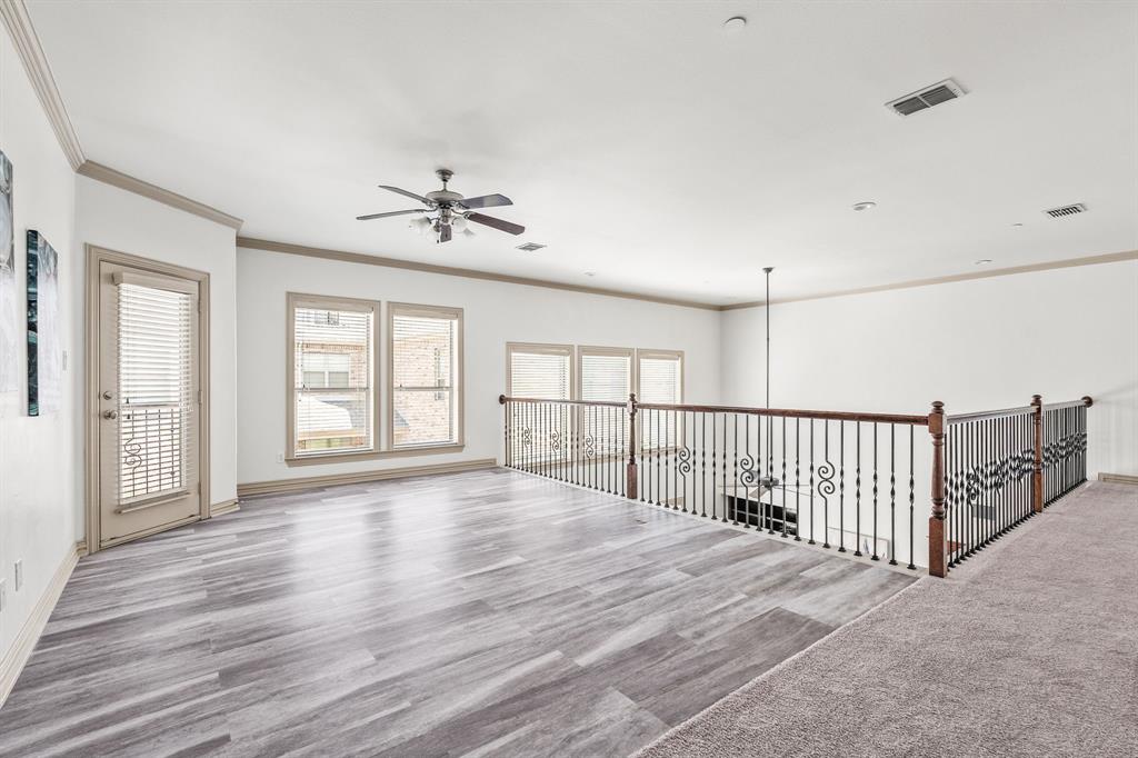 6393 Burnham Street Frisco, TX 75034 - Photo 23 of 30 a view of an empty room with a window and wooden floor