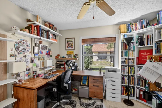 a view of a workspace with furniture and toys