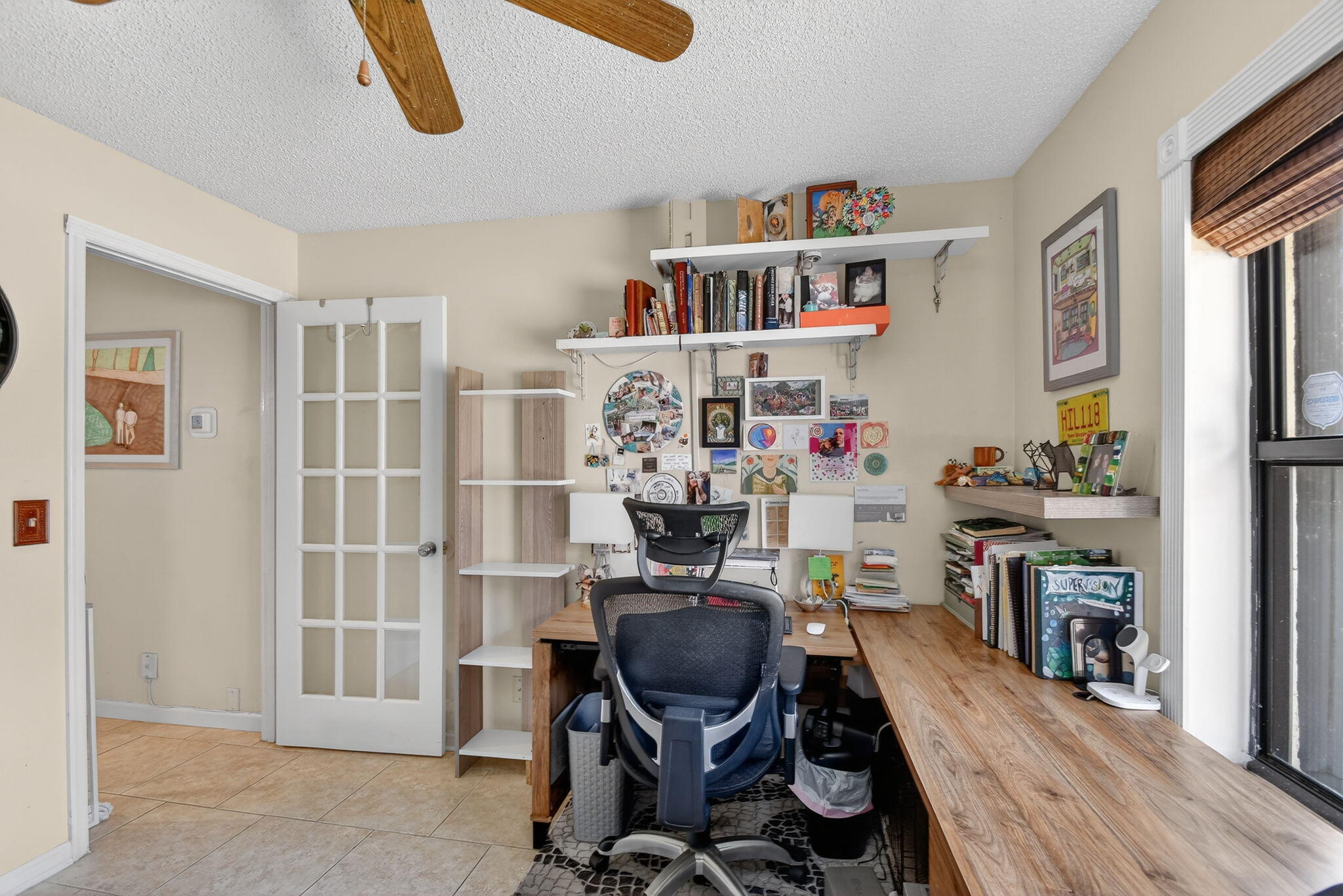117 Vía De Casas Norte Boynton Beach, FL 33426 - Photo 19 of 31 a view of a workspace with furniture and toys