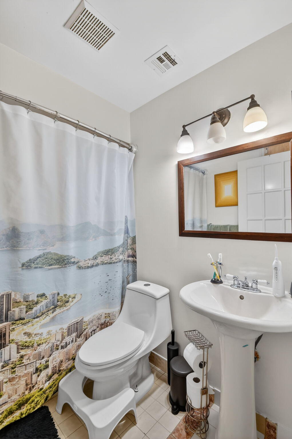 117 Vía De Casas Norte Boynton Beach, FL 33426 - Photo 20 of 31 a bathroom with a sink mirror vanity and toilet