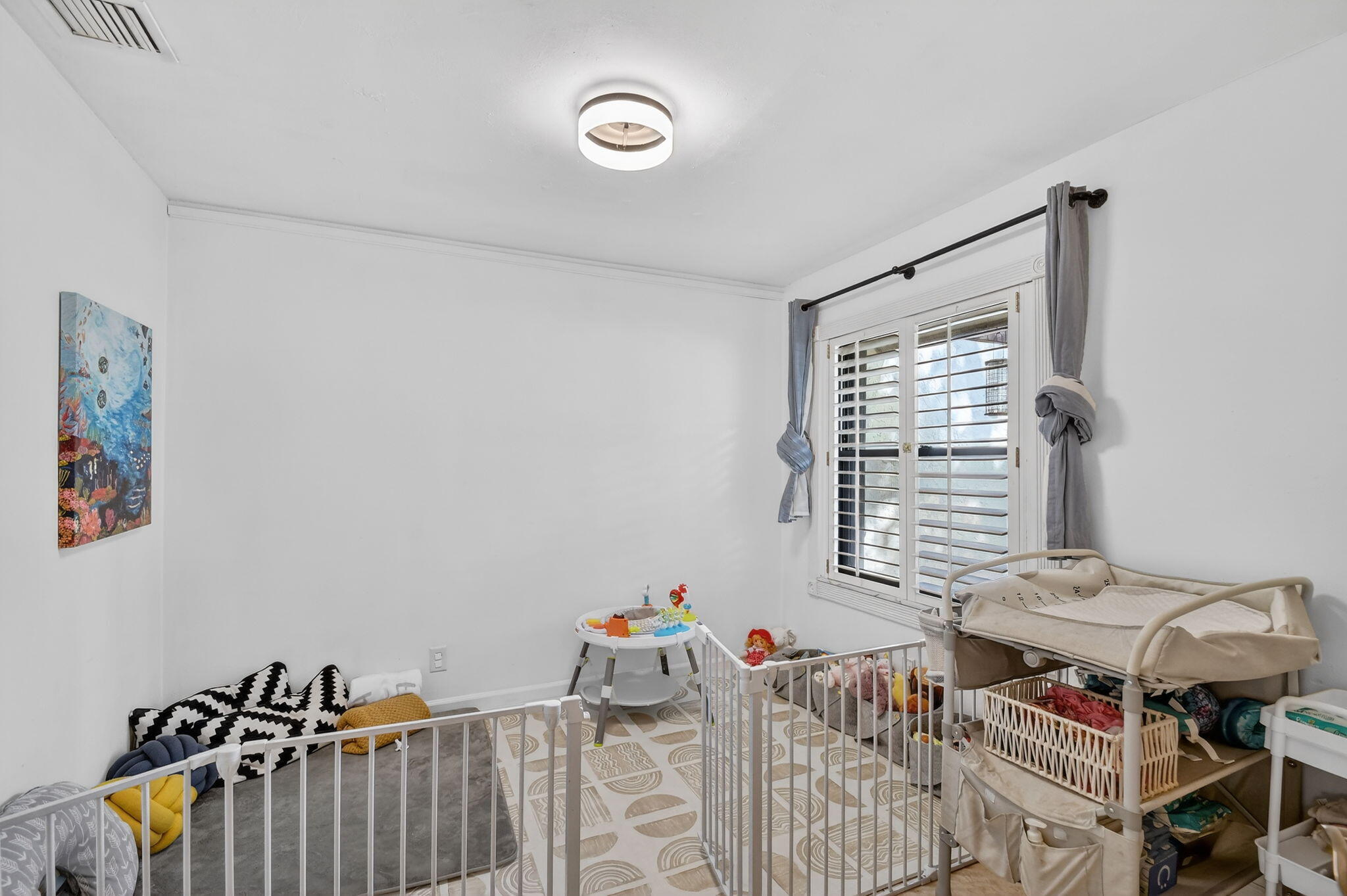 117 Vía De Casas Norte Boynton Beach, FL 33426 - Photo 21 of 31 a bedroom with furniture and a window