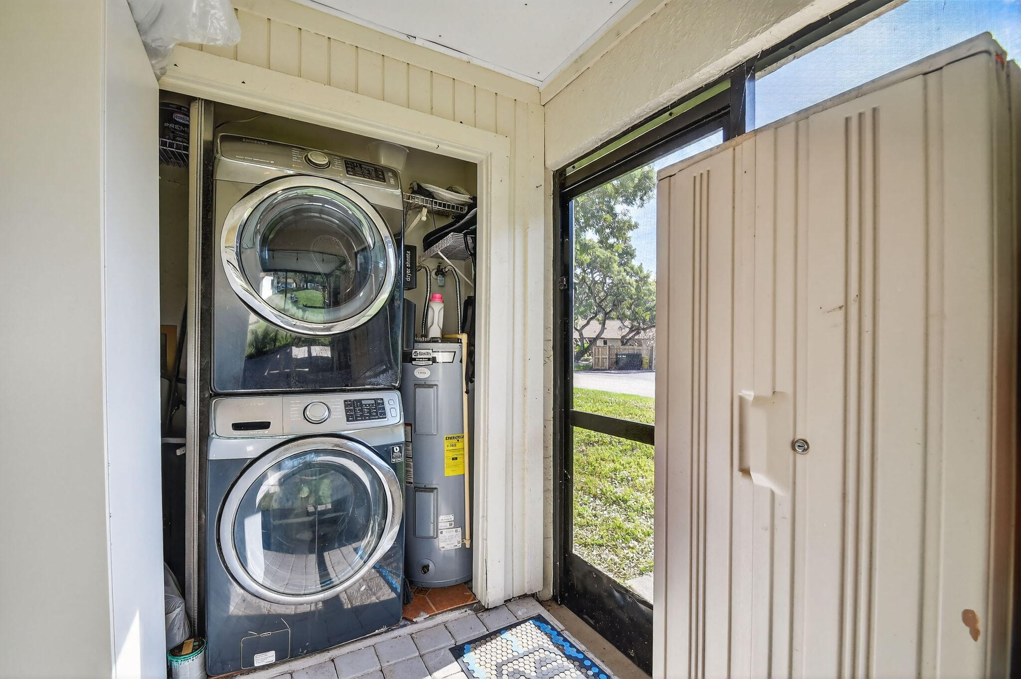 117 Vía De Casas Norte Boynton Beach, FL 33426 - Photo 25 of 31 a view of washer and dryer in a utility room