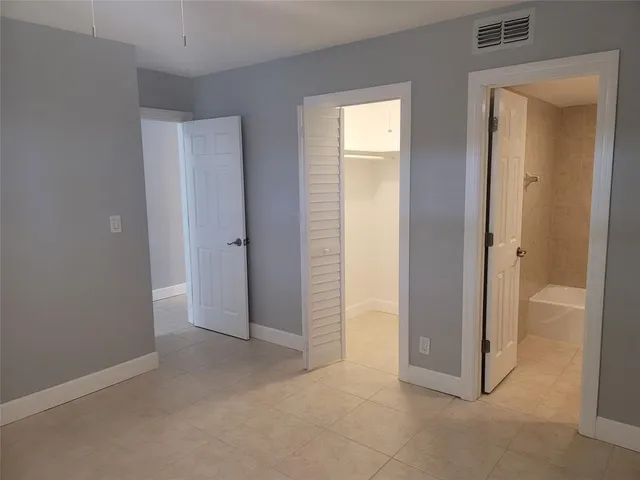 a empty closet with white paint