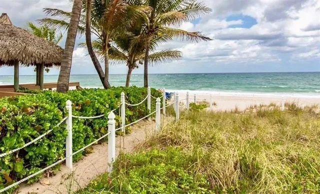 a view of a lake with a big yard