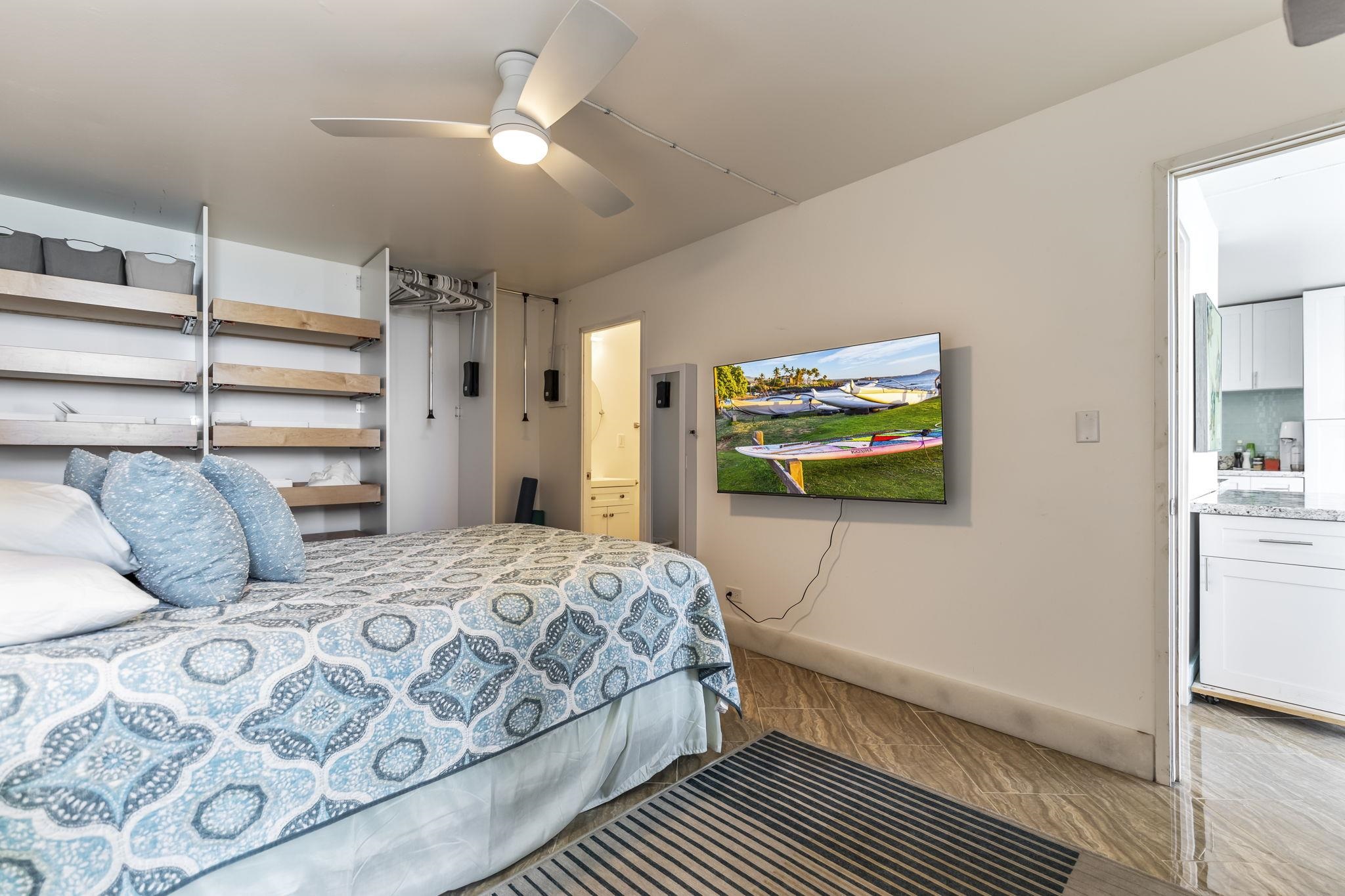 111 Kahului Beach Road, Unit A426 Kahului, HI 96732 - Photo 16 of 24 a bedroom with a bed and a walk in closet