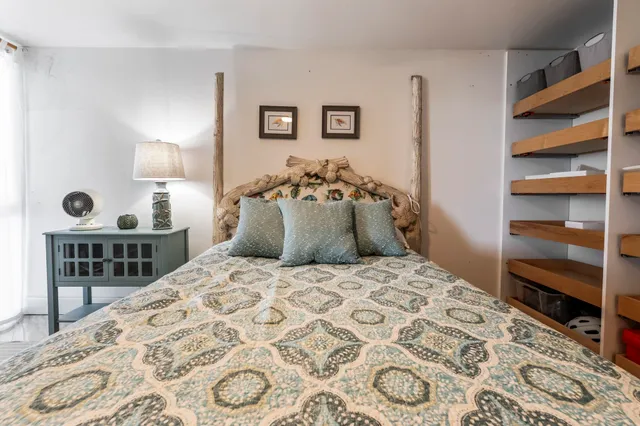 a room with furniture and a wooden floor