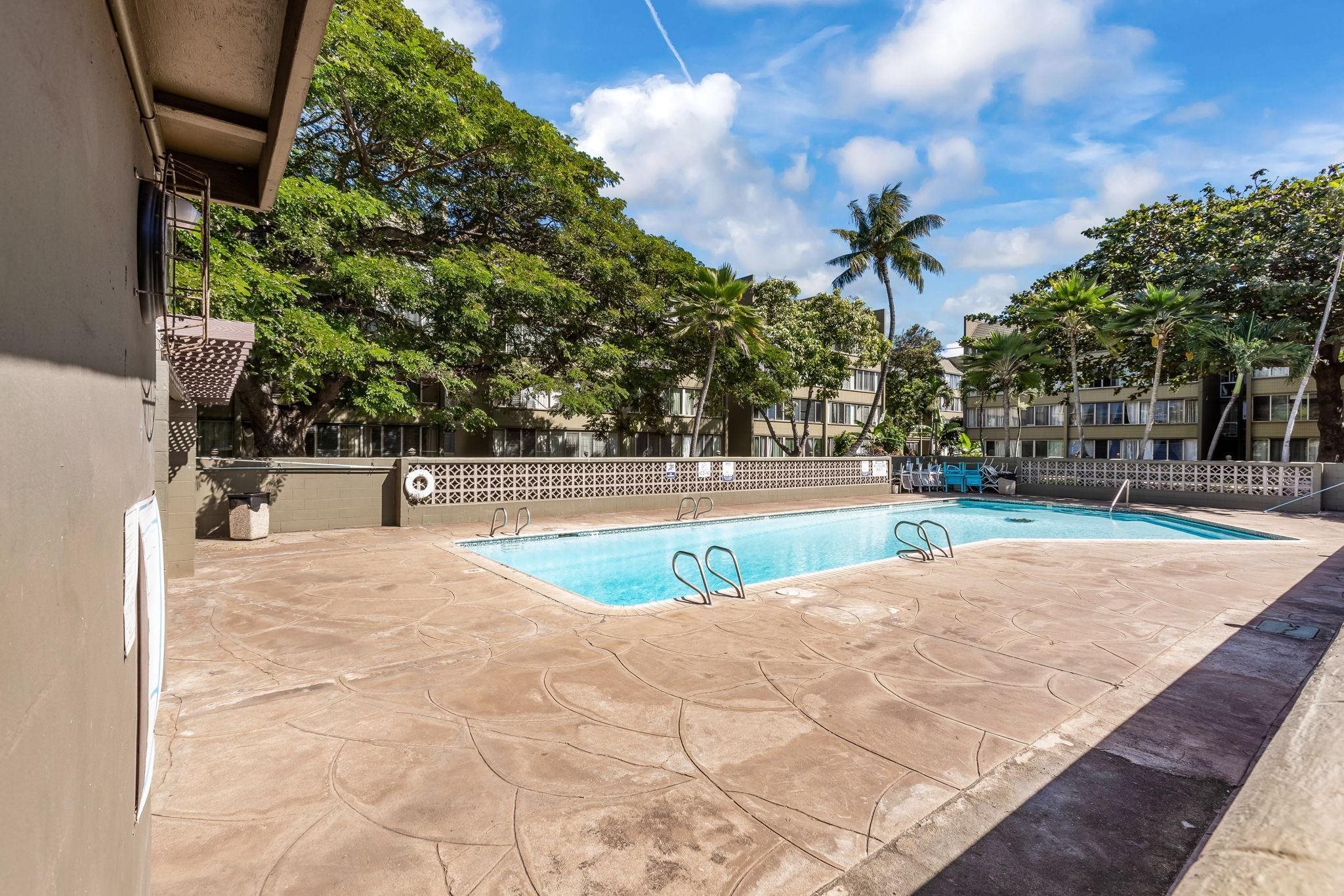 111 Kahului Beach Road, Unit A426 Kahului, HI 96732 - Photo 23 of 24 a view of a swimming pool with a yard