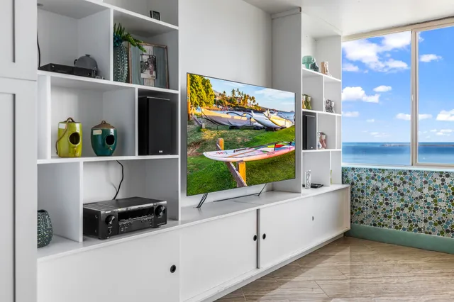 a kitchen with stainless steel appliances a sink and a stove