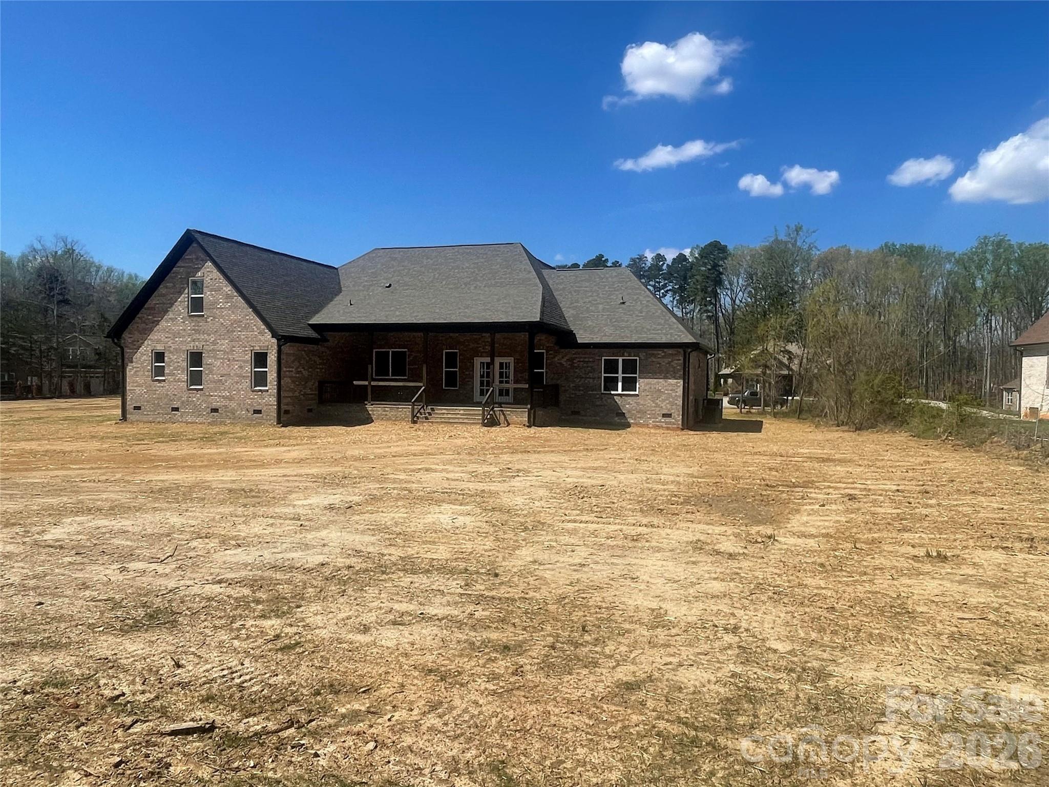 321 Stone Ridge Drive Salisbury, NC 28146 - Photo 5 of 39 a front view of a house with a yard