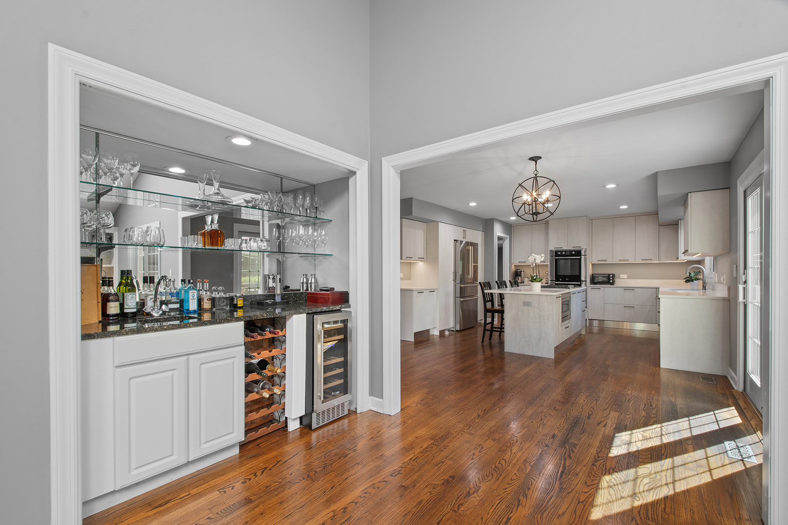 100 Boardman Court Lake Bluff, IL 60044 - Photo 14 of 33 a kitchen with white cabinets and stainless steel appliances