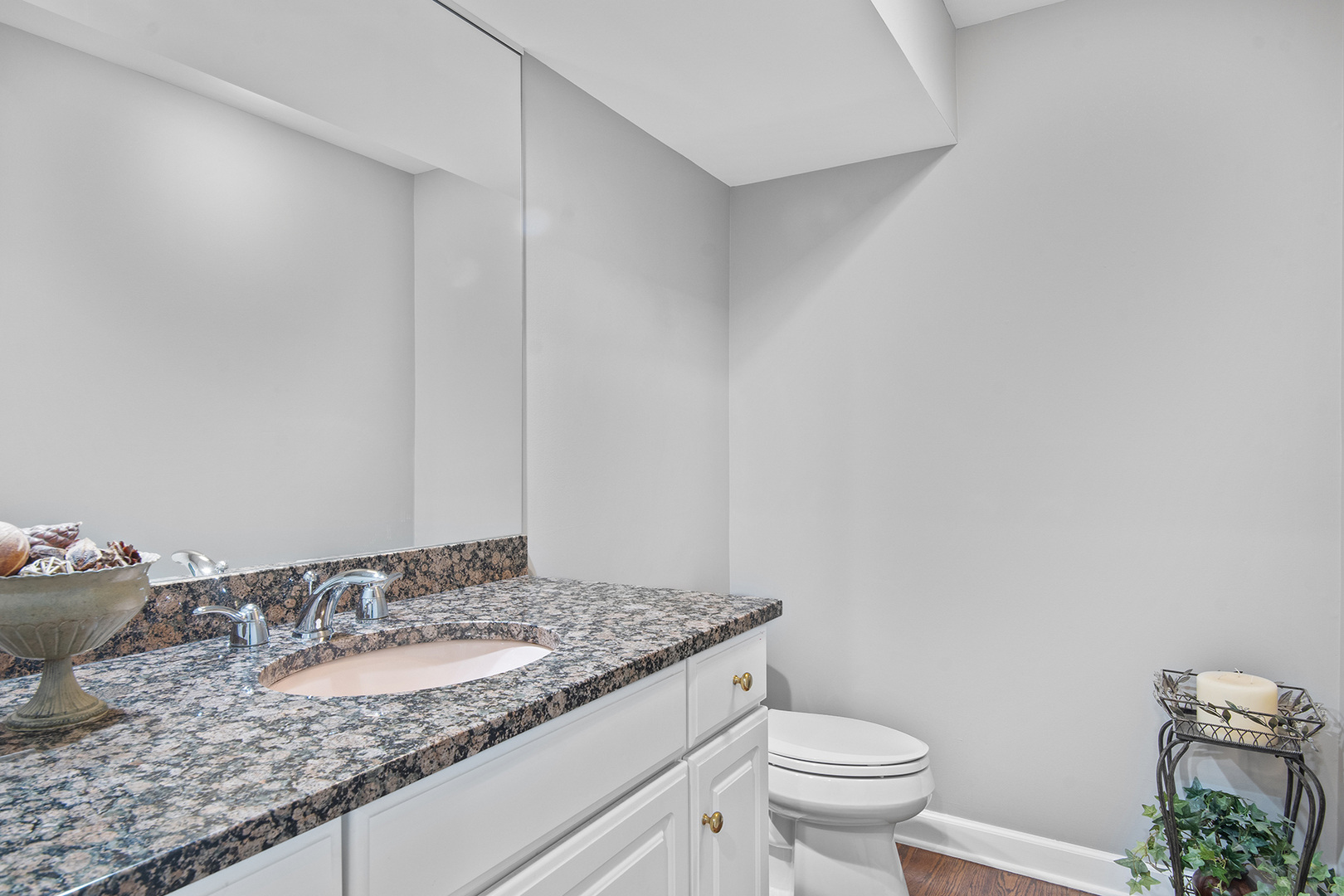 100 Boardman Court Lake Bluff, IL 60044 - Photo 17 of 33 a bathroom with a granite countertop sink and a toilet