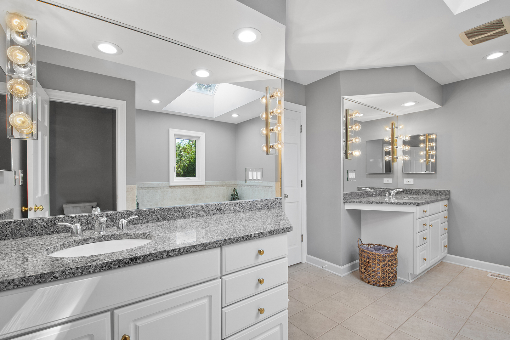 100 Boardman Court Lake Bluff, IL 60044 - Photo 20 of 33 a bathroom with a sink double vanity granite and a mirror