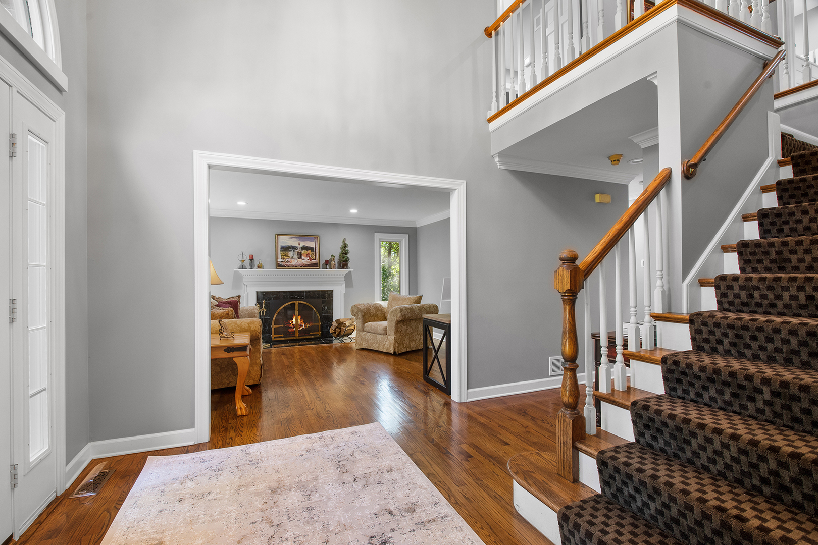 100 Boardman Court Lake Bluff, IL 60044 - Photo 3 of 33 a view of a livingroom with wooden floor and furniture