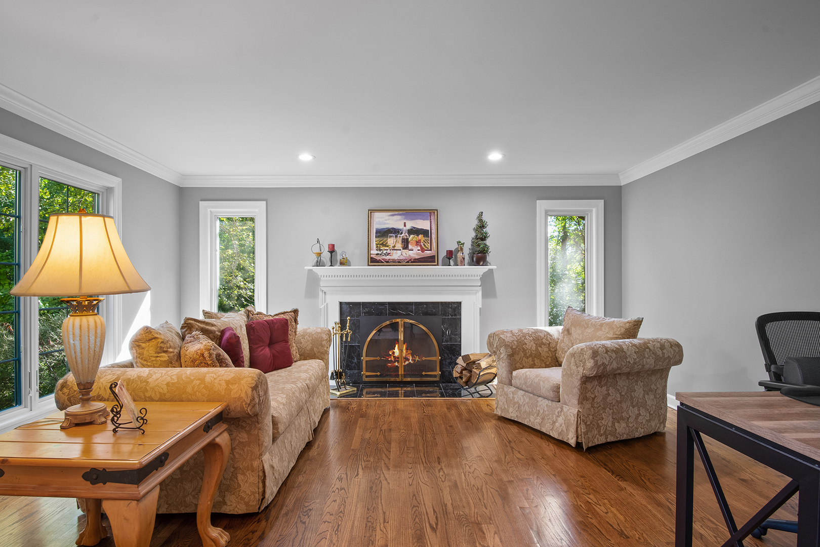 100 Boardman Court Lake Bluff, IL 60044 - Photo 5 of 33 a living room with furniture and a fireplace