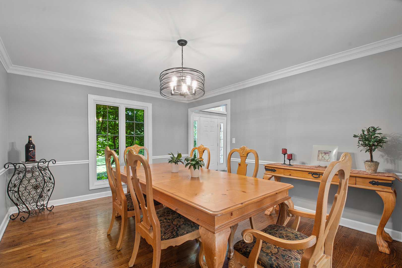 100 Boardman Court Lake Bluff, IL 60044 - Photo 7 of 33 a view of a dining room with furniture window and wooden floor