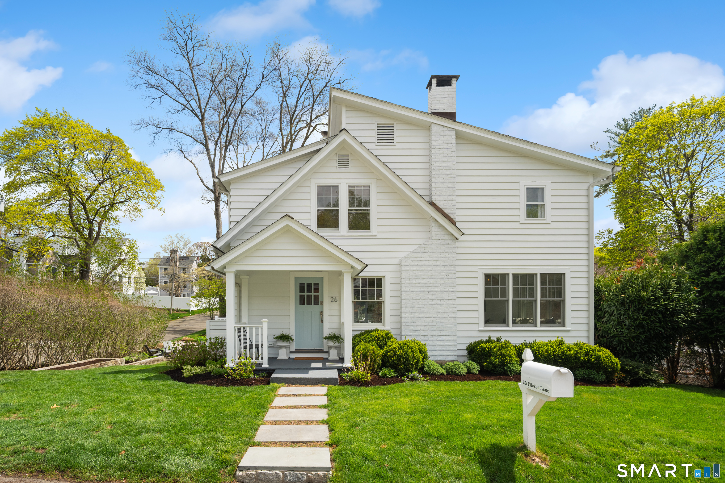 26 Flicker Lane Norwalk, CT 06853 - Photo 2 of 26 a front view of a house with a yard