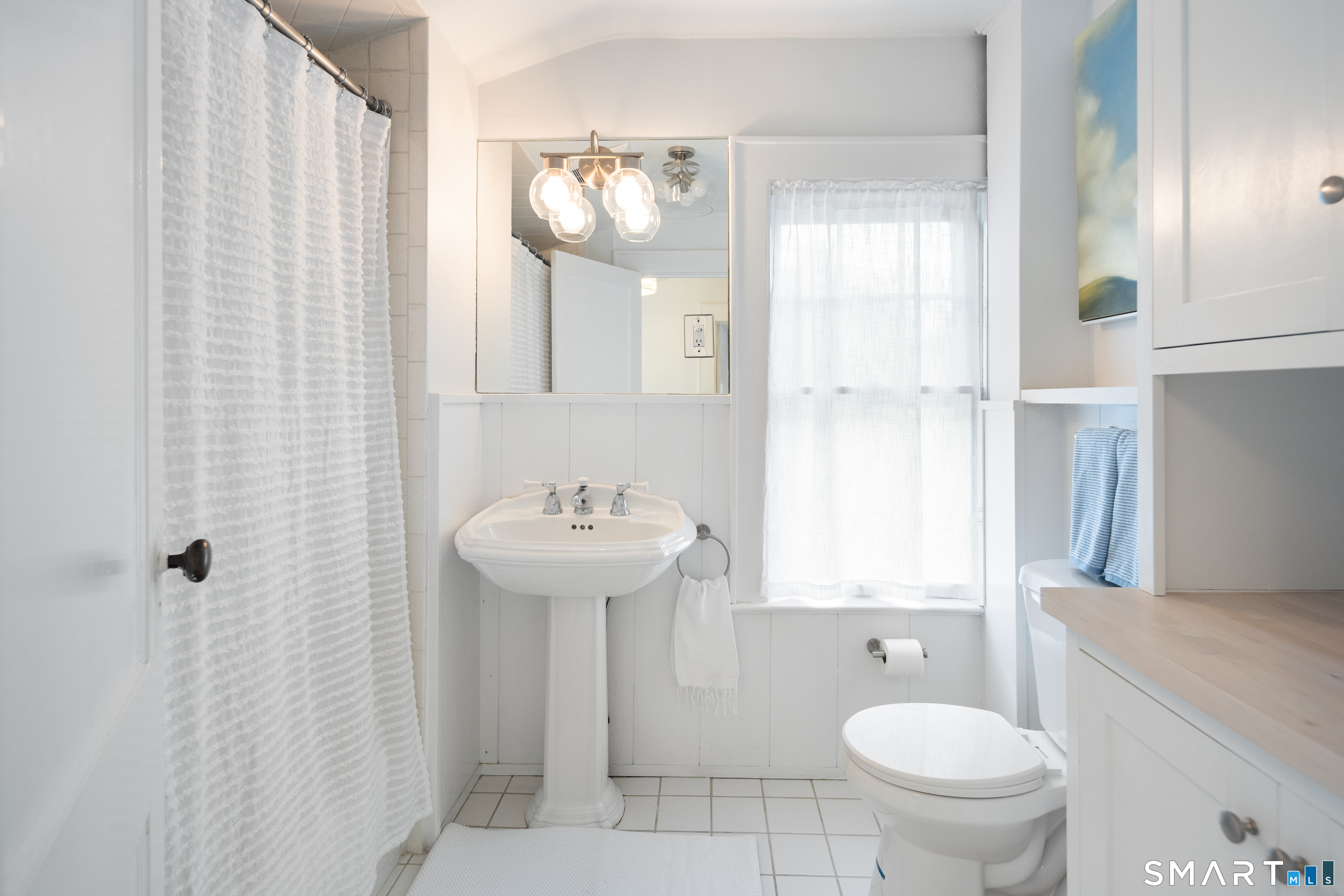 26 Flicker Lane Norwalk, CT 06853 - Photo 23 of 26 a bathroom with a sink toilet and shower