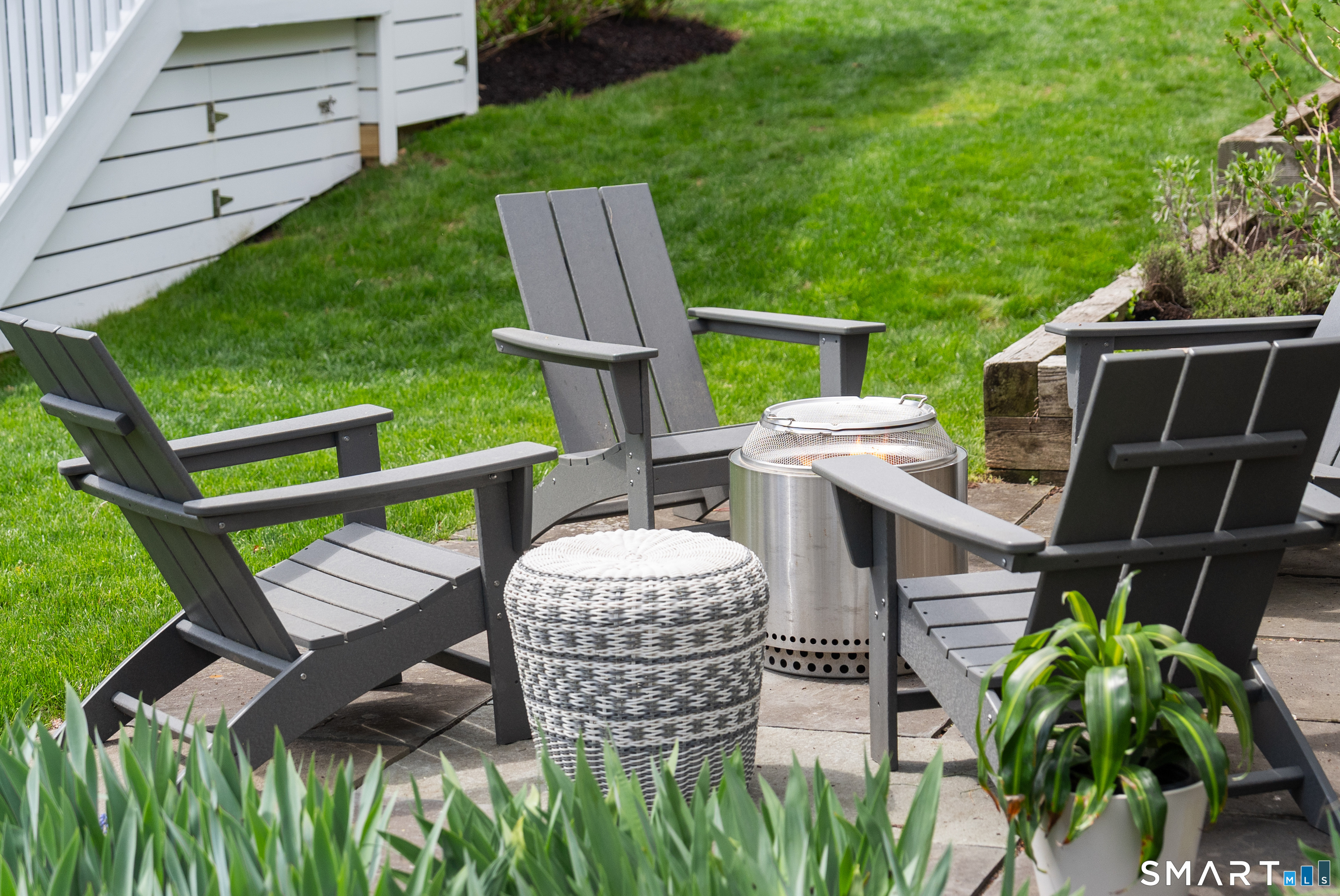26 Flicker Lane Norwalk, CT 06853 - Photo 25 of 26 a view of outdoor kitchen outdoor seating and green space
