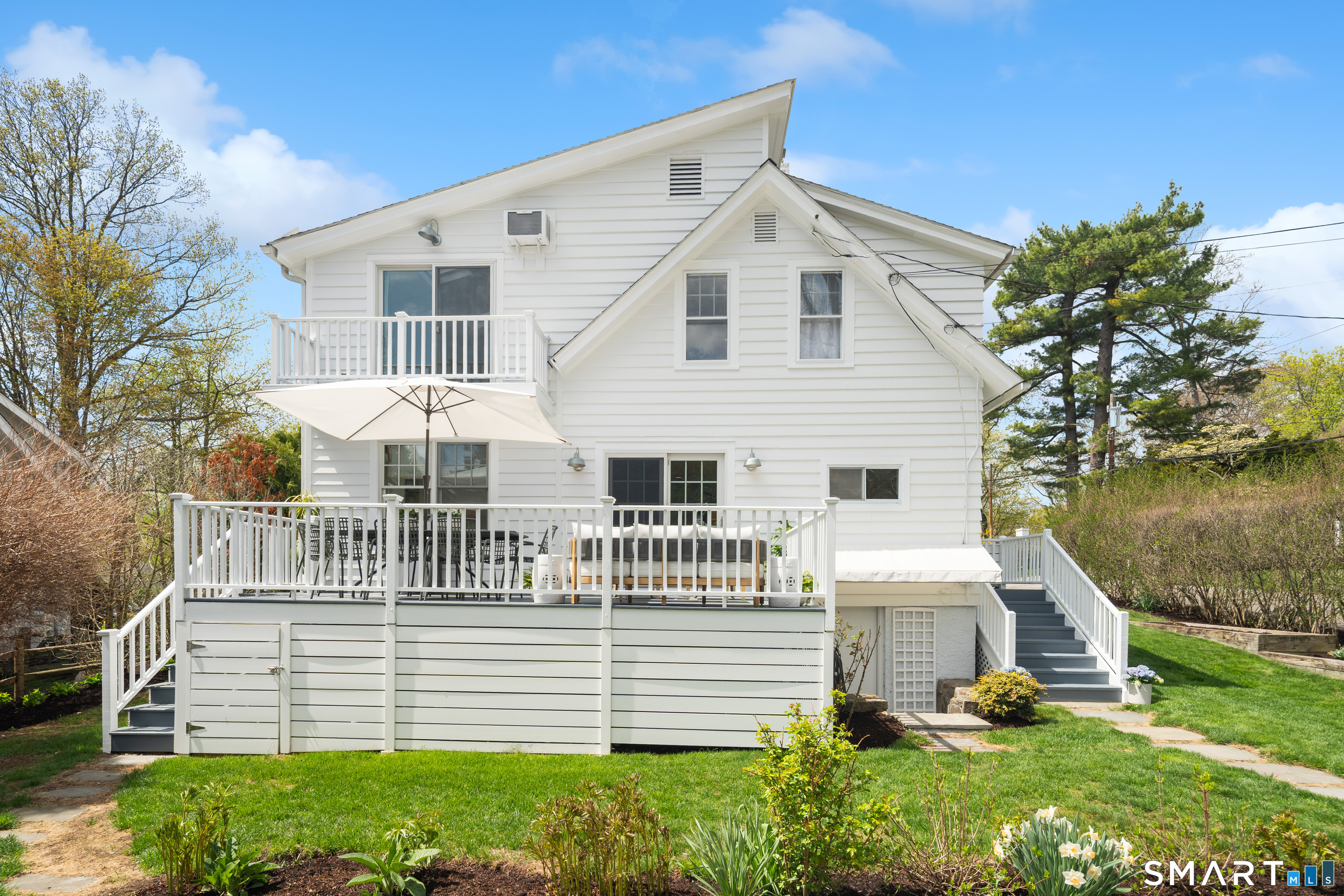 26 Flicker Lane Norwalk, CT 06853 - Photo 26 of 26 a front view of a house with a yard