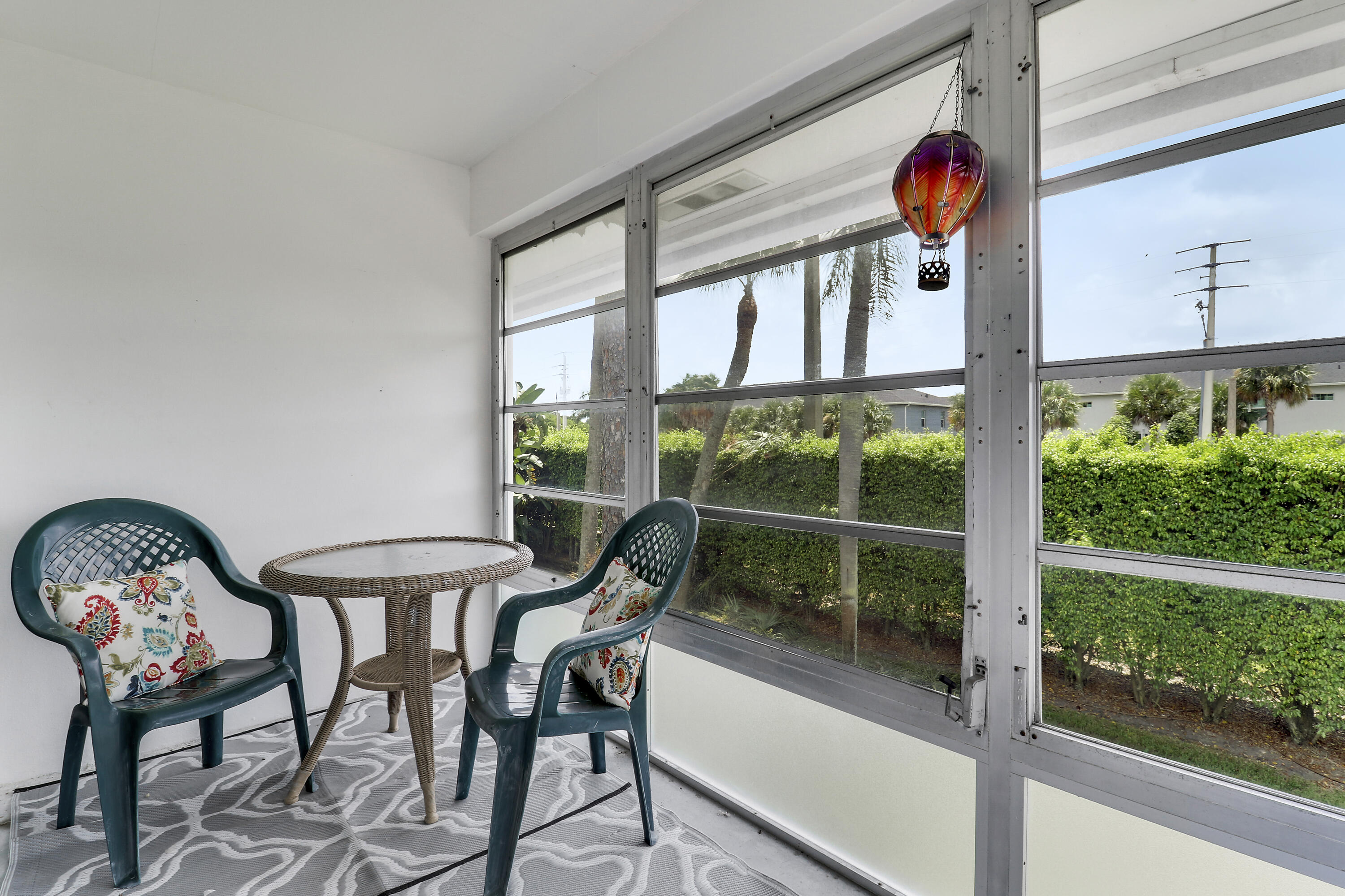 2929 Southeast Ocean Boulevard, Unit 19 Stuart, FL 34996 - Photo 16 of 19 a view of a dining room with furniture window and outside view