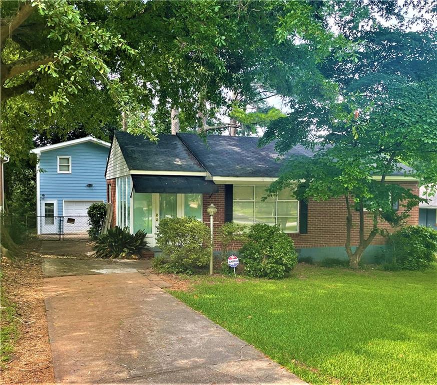 928 Pegg Road East Point, GA 30344 - Photo 1 of 1 front view of a house with a yard