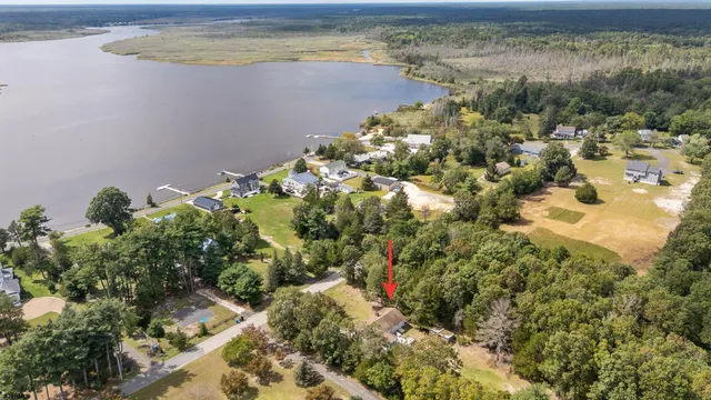 a view of a lake with a yard