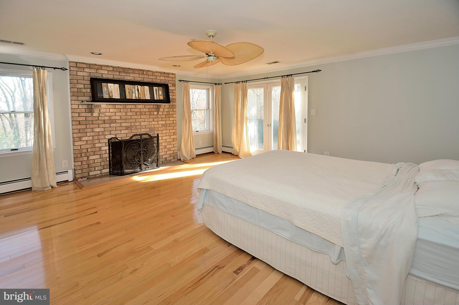 2800 Bryan Point Road Accokeek, MD 20607 - Photo 13 of 30 Master Bedroom Suite w/ Wood Burning Fireplace