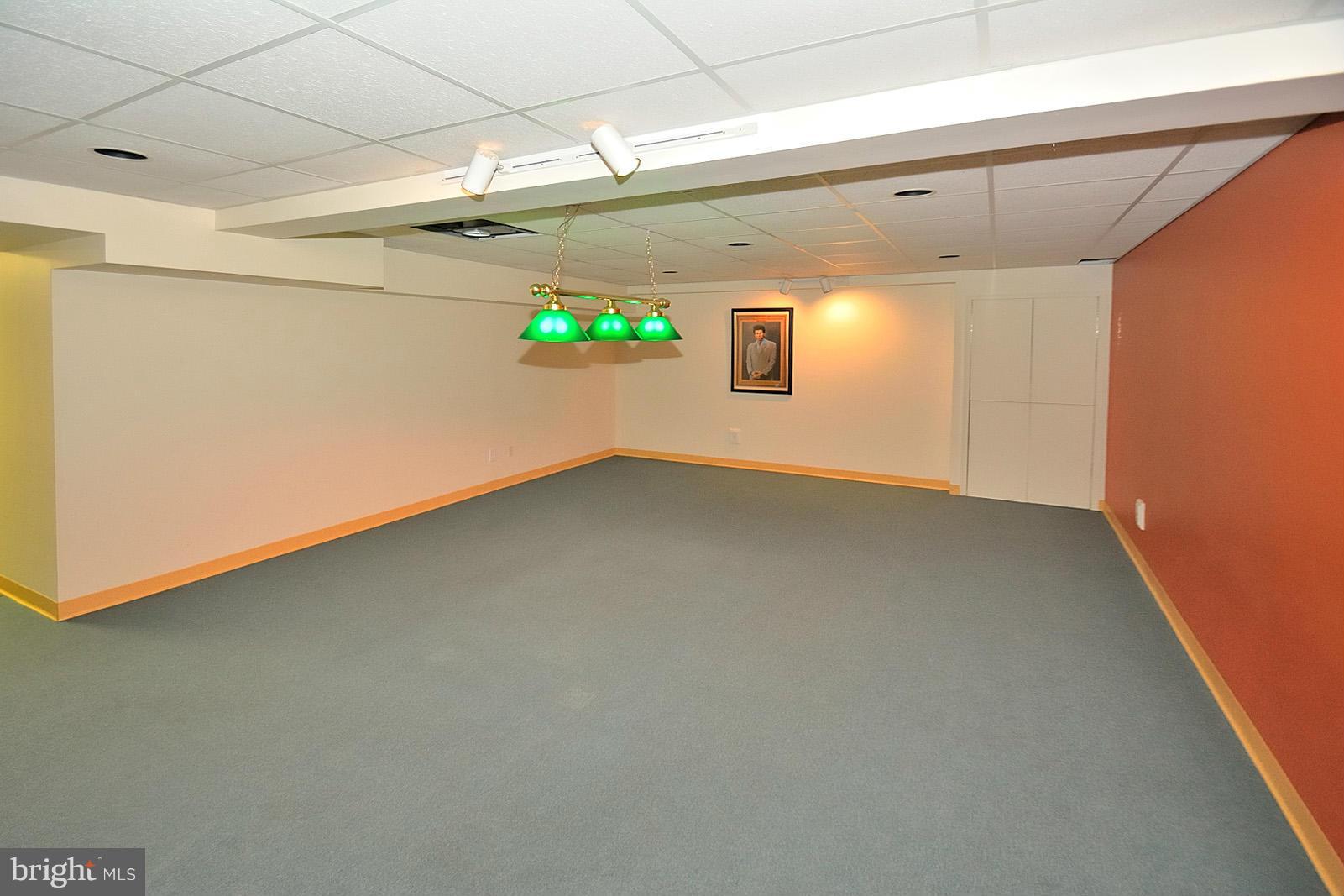 2800 Bryan Point Road Accokeek, MD 20607 - Photo 22 of 30 Lower Level Game Room, Perfect for a Pool Table!