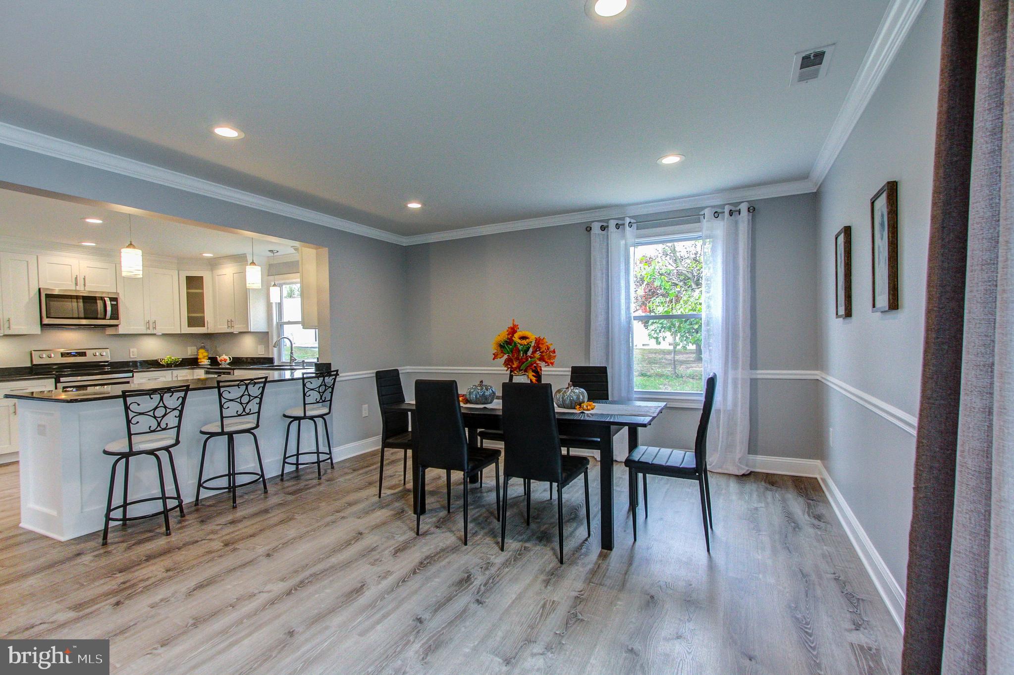 1517 River Road Croydon, PA 19021 - Photo 11 of 37 Dining Area 15 x10 w/ Sliders leading to Deck