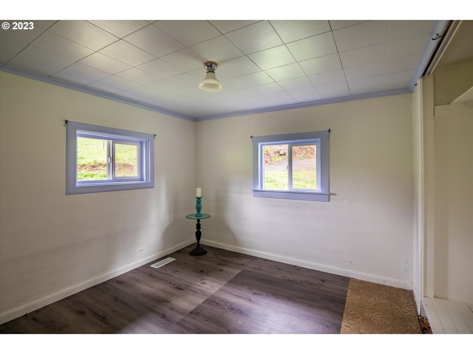 63657 Olive Barber Road Coos Bay, OR 97420 - Photo 14 of 34 a view of an empty room with a window