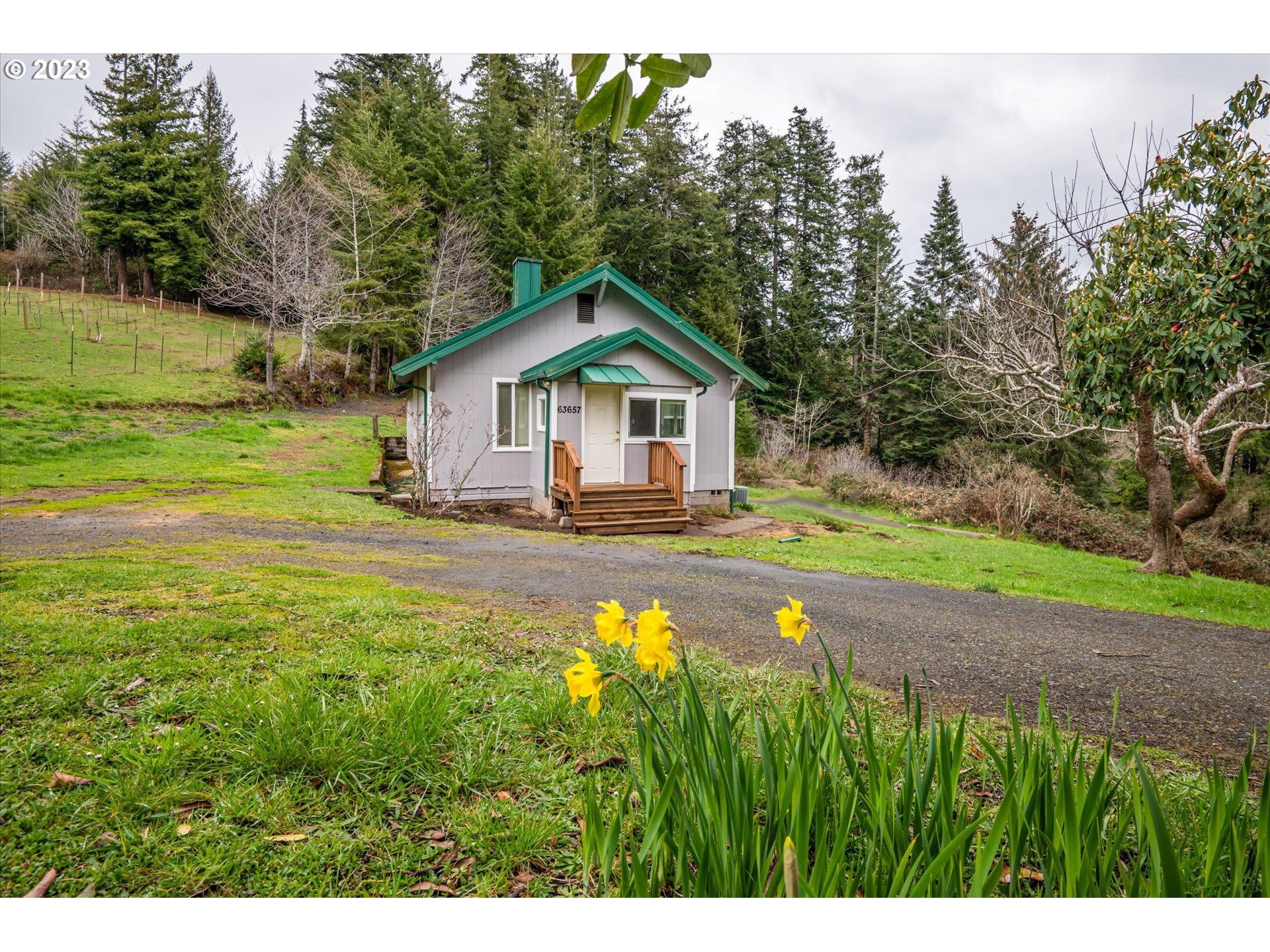 63657 Olive Barber Road Coos Bay, OR 97420 - Photo 20 of 34 a house view with a outdoor space