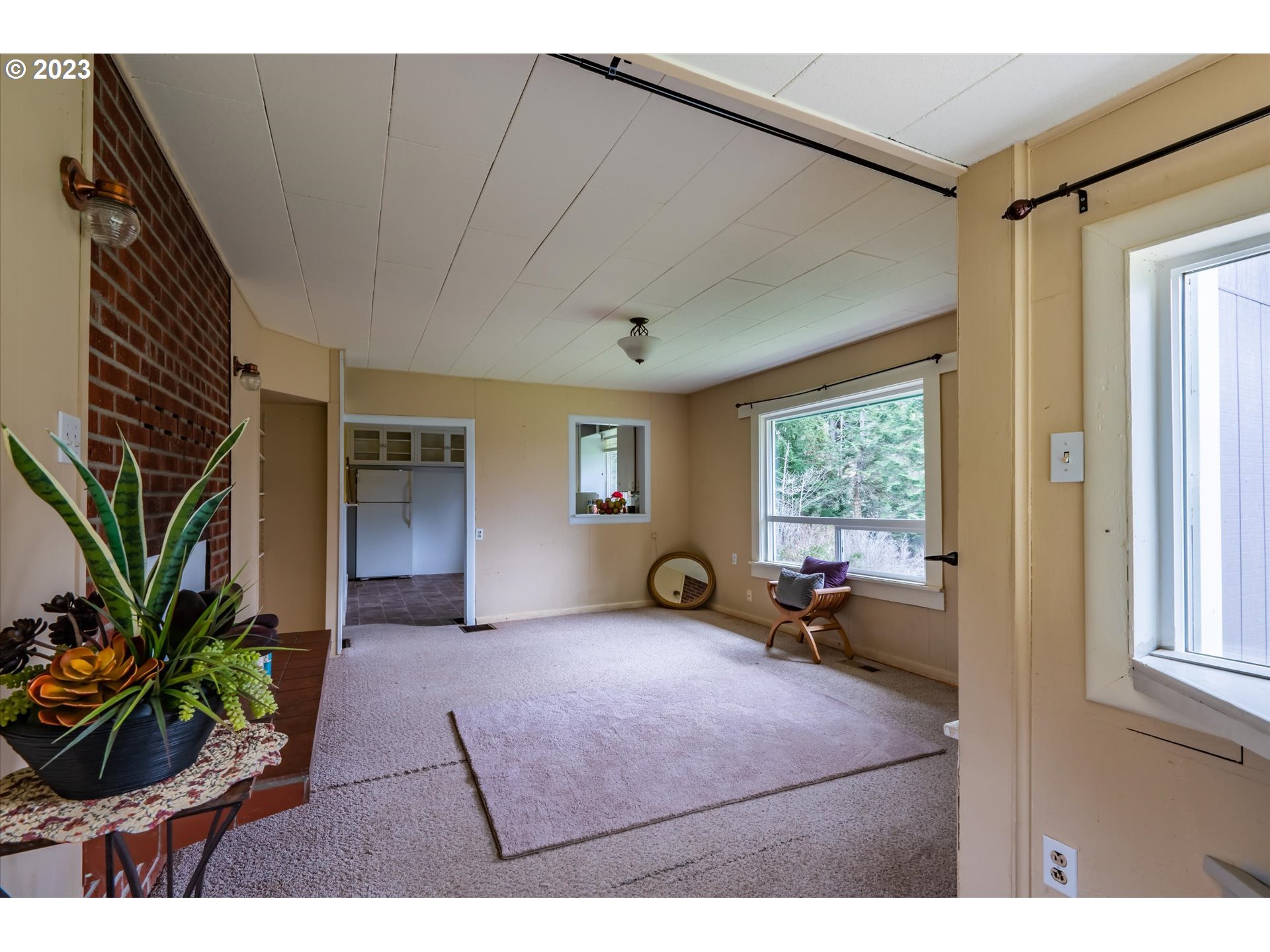 63657 Olive Barber Road Coos Bay, OR 97420 - Photo 4 of 34 a bedroom with furniture and a window