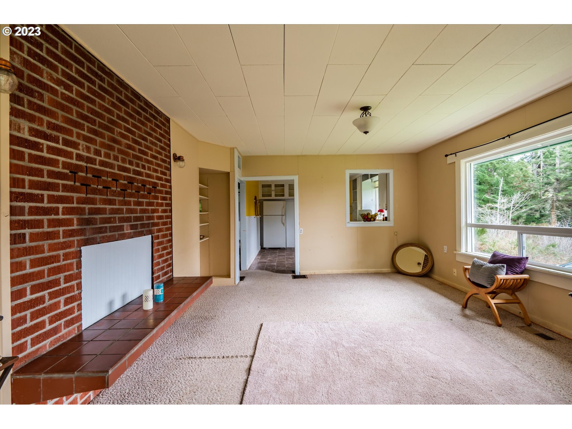 63657 Olive Barber Road Coos Bay, OR 97420 - Photo 7 of 34 a view of a livingroom with furniture and windows