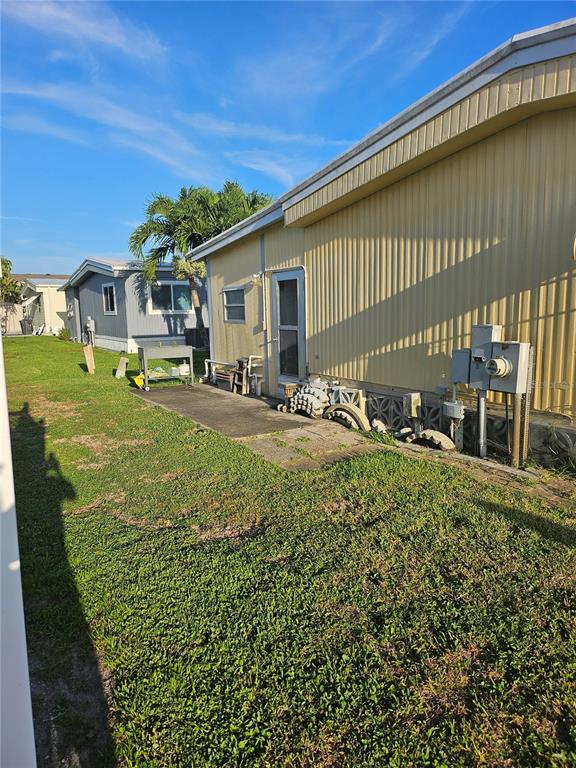 26080 Kings Road Bonita Springs, FL 34135 - Photo 3 of 10 a view of a house with backyard