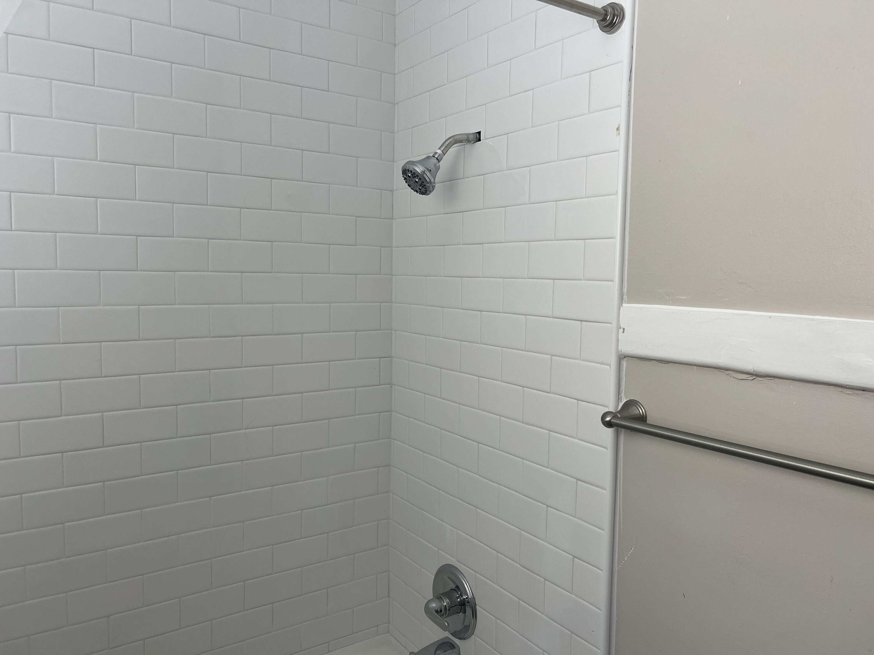 2202 28th Street, Unit B Lubbock, TX 79411 - Photo 16 of 17 a close up of a shower