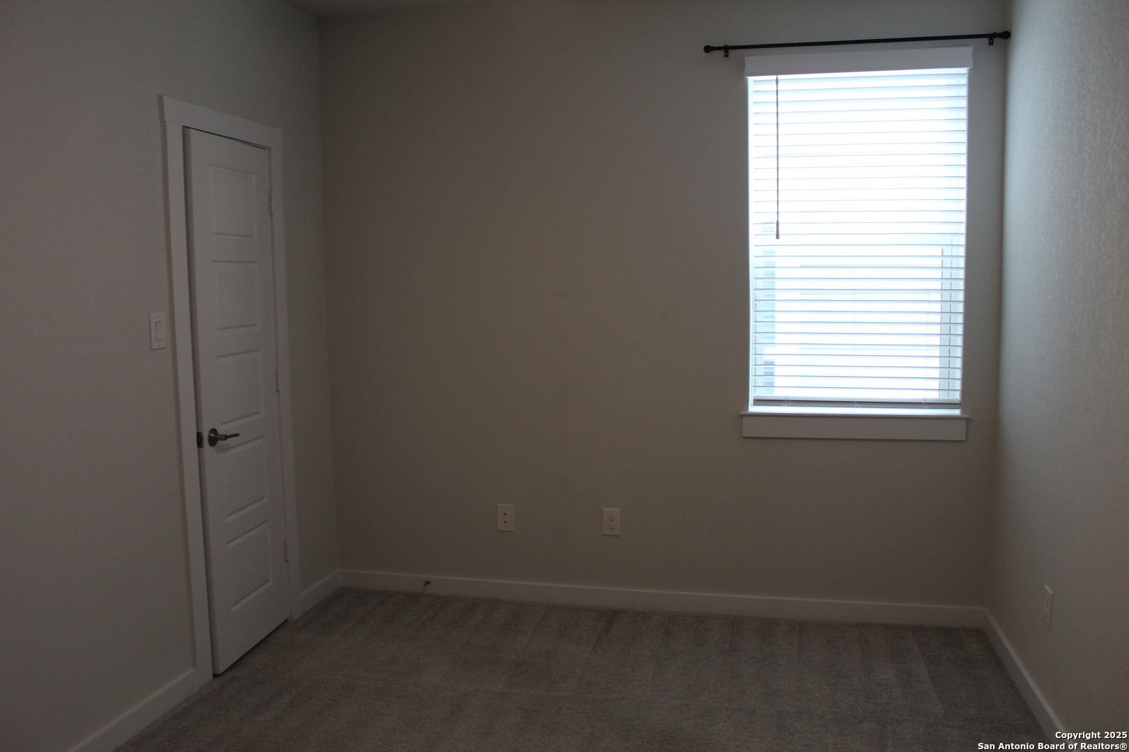 5843 Whitby Road, Unit 33 San Antonio, TX 78240 - Photo 12 of 15 an empty room with a window
