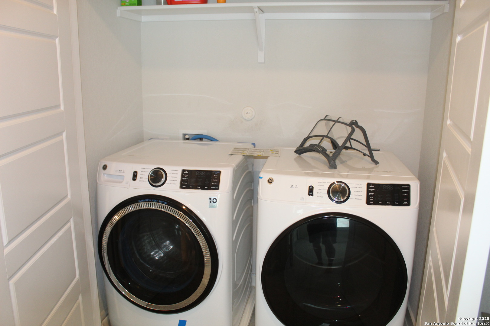 5843 Whitby Road, Unit 33 San Antonio, TX 78240 - Photo 14 of 15 a utility room with dryer and washer