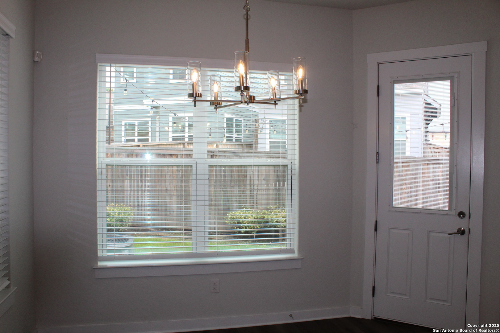 5843 Whitby Road, Unit 33 San Antonio, TX 78240 - Photo 7 of 15 a room that has a window and a table in it