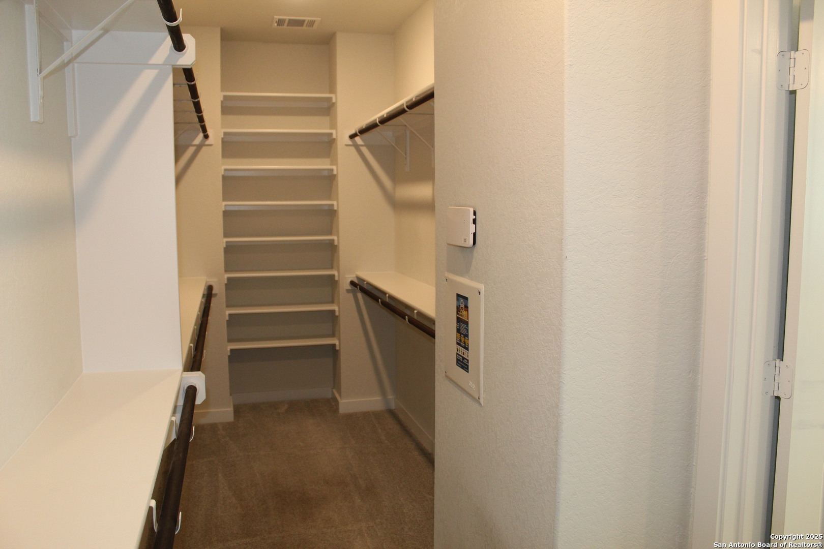 5843 Whitby Road, Unit 33 San Antonio, TX 78240 - Photo 10 of 15 a view of staircase with white walls