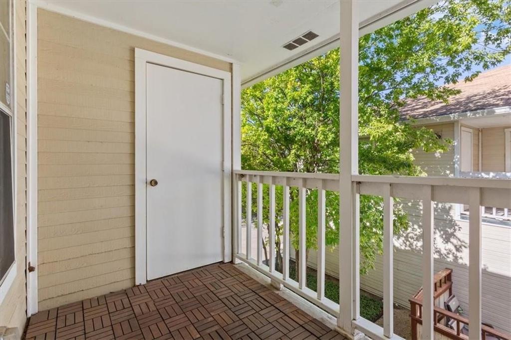 2306 Melissa Drive Waco, TX 76708 - Photo 20 of 22 a view of a balcony with wooden floor